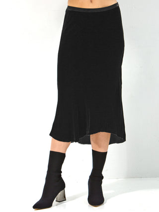 Go velvet underground skirt - Machine washable 82% rayon and 18% silk washed velvet blend skirt with bias cut and an asymmetrical seamed hem. This item also has a velvet elastic waistband at a midi length.