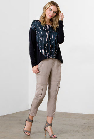 ICONIC go utility pant - Machine washable silk and spandex blend pants with banded waist that sits just below the natural waist at a 9.5 inch rise on a size 4. It has a zip fly snap closure with multiple pocket detailing and burnished hardware trim and cropped skinny-leg fit. It has a zip-slit hem and a 26 inch inseam length based on a size 4. 
