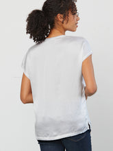 Load image into Gallery viewer, Go luxe revisited tee - Machine washable pull over silk charmeuse tee with raw edges, vee neck and a center front seam detail. It features extended sleeve with a curved high low hem. 