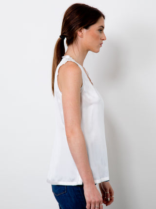 ICONIC go> tee - Machine washable easy fit bra-friendly silk charmeuse tee with scoop neck and raw edge trim at neck and armholes, it has a straight hem and side vents for ease.  