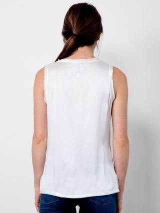ICONIC go> tee - Machine washable easy fit bra-friendly silk charmeuse tee with scoop neck and raw edge trim at neck and armholes, it has a straight hem and side vents for ease.  