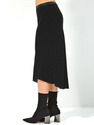 Go velvet underground skirt - Machine washable 82% rayon and 18% silk washed velvet blend skirt with bias cut and an asymmetrical seamed hem. This item also has a velvet elastic waistband at a midi length. 